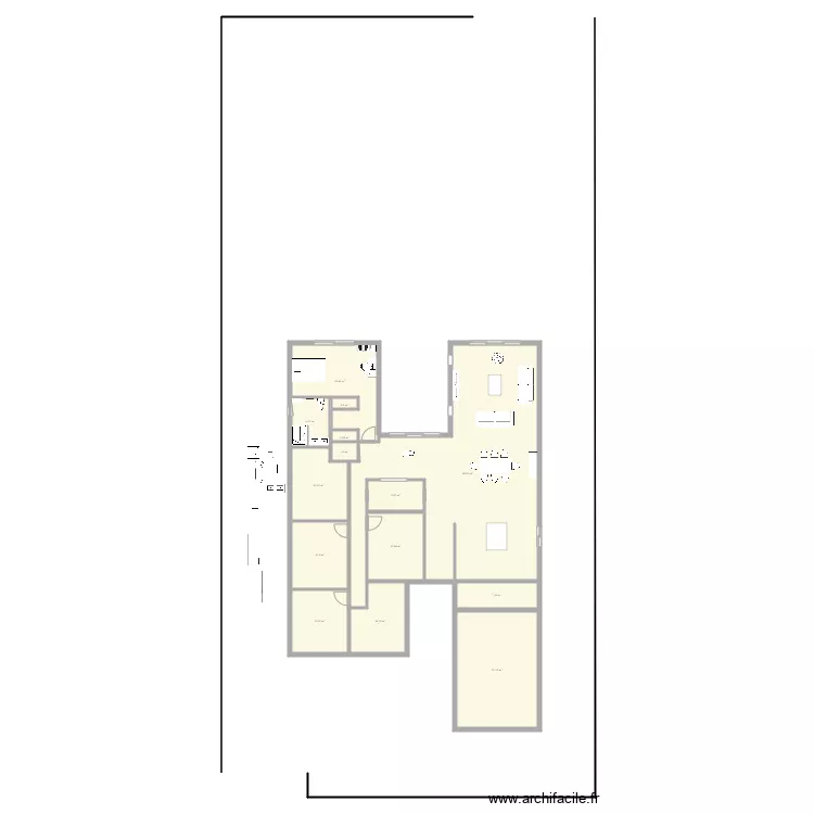 Maison plein pied . Plan de 
