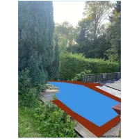 future piscine vue de dessus par la pelouse
